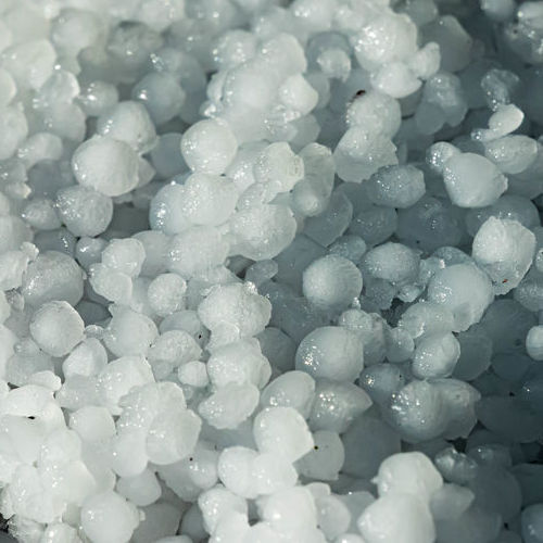 Pile of hail drops that has just fallen. Close up. . High quality photo